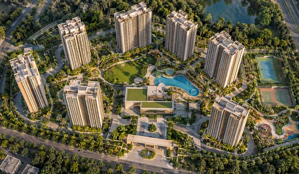 Aerial view of landscaped gardens, central park and sports courts at Sobha Hennur Road